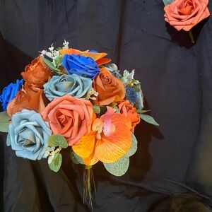 Vibrant Floral Bouquet with Orange, Blue, and dusty blue.